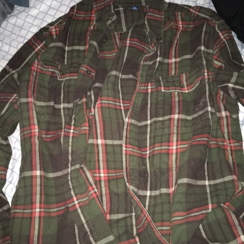 A plaid olive green and orange flannel.
